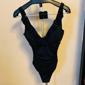 Ruffles and ruching one piece bathing suit